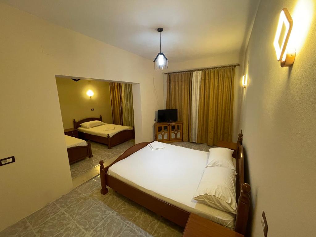 Postel nebo postele na pokoji v ubytování Hotel Belvedere