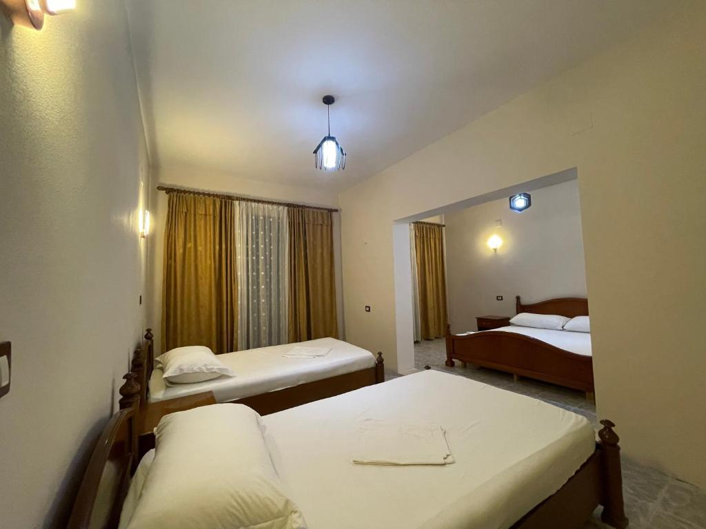 Postel nebo postele na pokoji v ubytování Hotel Belvedere