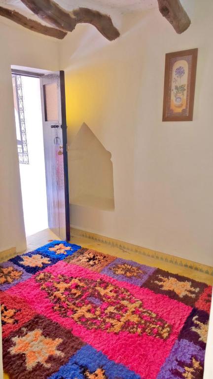 Letto o letti in una camera di Riad Benyara