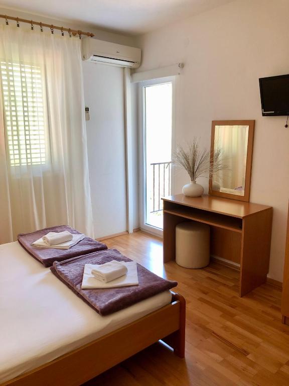 Postel nebo postele na pokoji v ubytování Hotel B&B CHAMBERLAIN