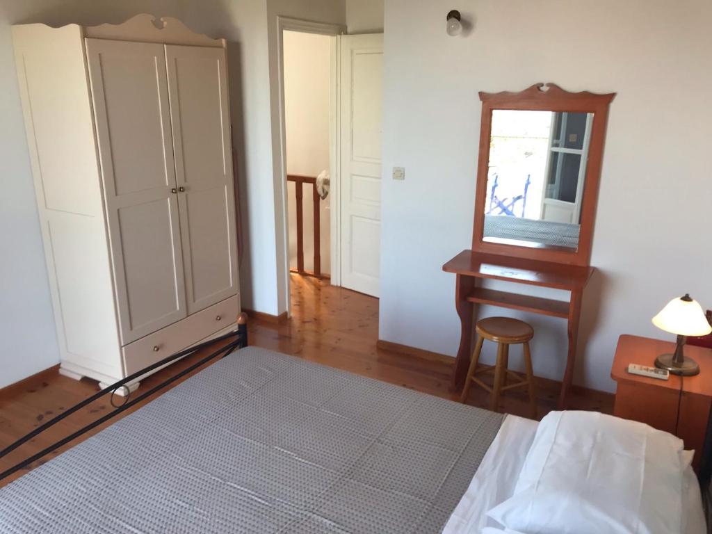 Posteľ alebo postele v izbe v ubytovaní Artemis Villa