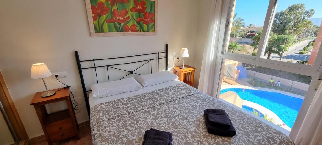 Bazén v ubytování Homes of Spain, Apartamentos Paraiso, Ed Palmerston, Atico J a pie de Playa, piscina privada en solárium, WI-FI nebo v jeho okolí