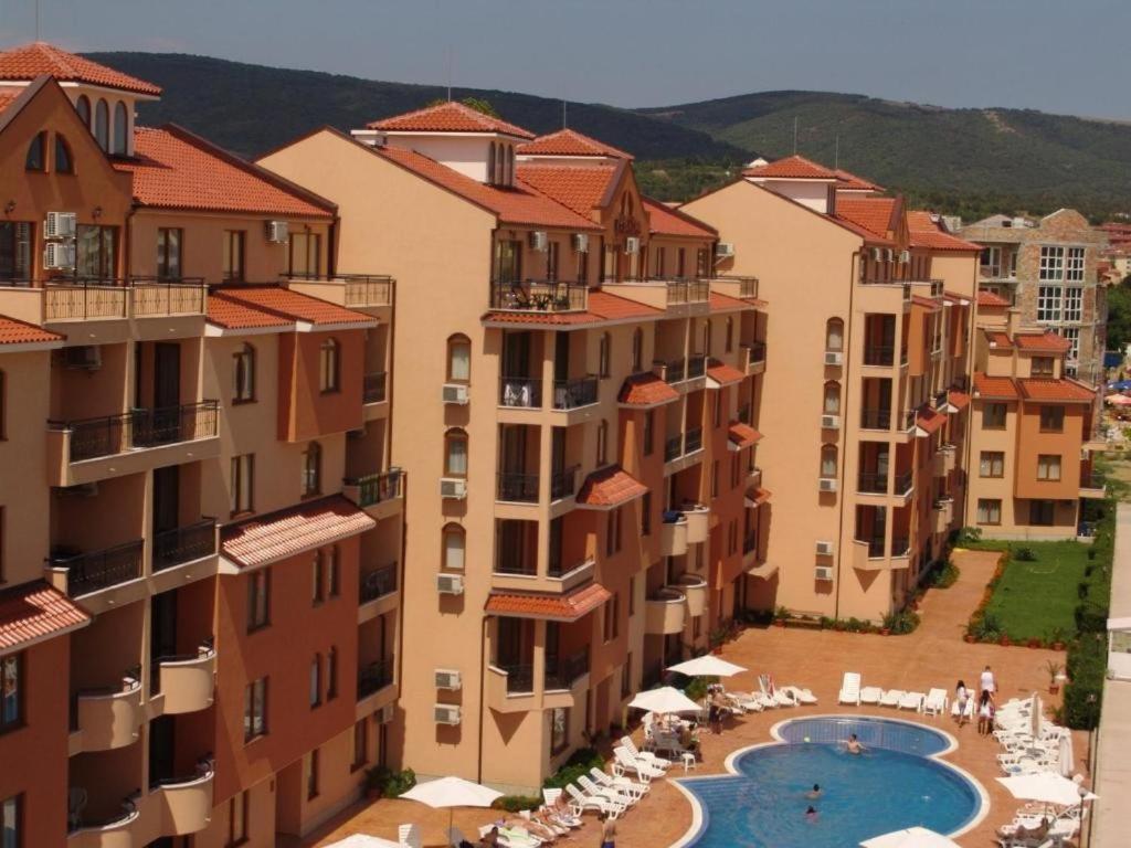 a view of a group of buildings with a swimming pool at Holidays apartment Kassandra Sunny Beach in Sunny Beach
