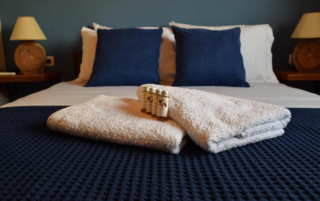 Postel nebo postele na pokoji v ubytování Blu Casa Del Mare