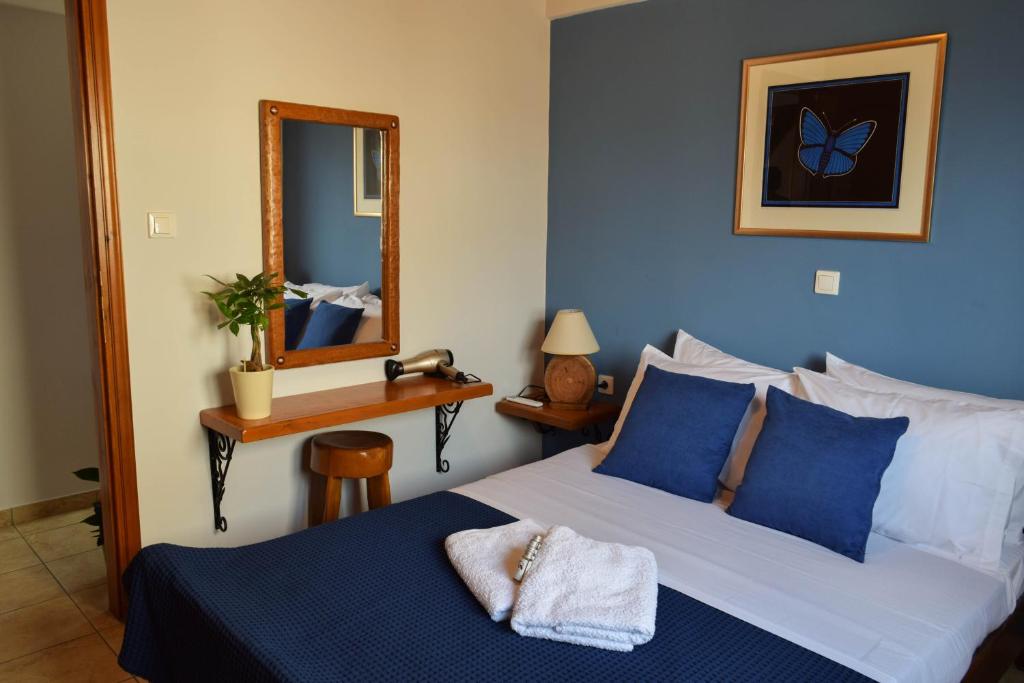 Postel nebo postele na pokoji v ubytování Blu Casa Del Mare