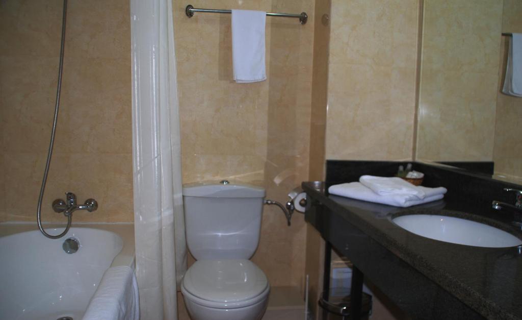 Koupelna v ubytování Hotel Ancor
