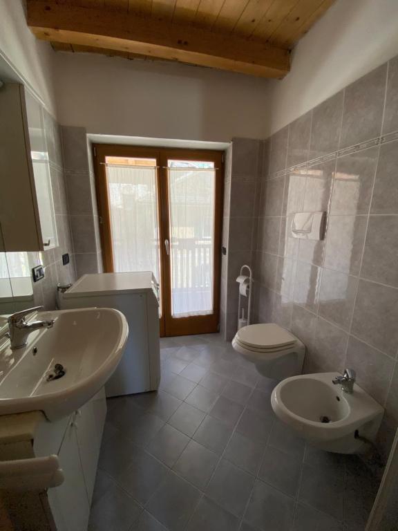 Kúpeľňa v ubytovaní Casa Fiemme Panchià