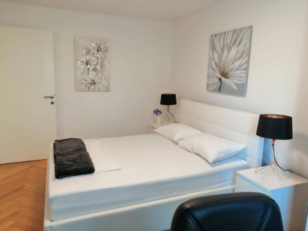 Postel nebo postele na pokoji v ubytování APARTMAN D&D***