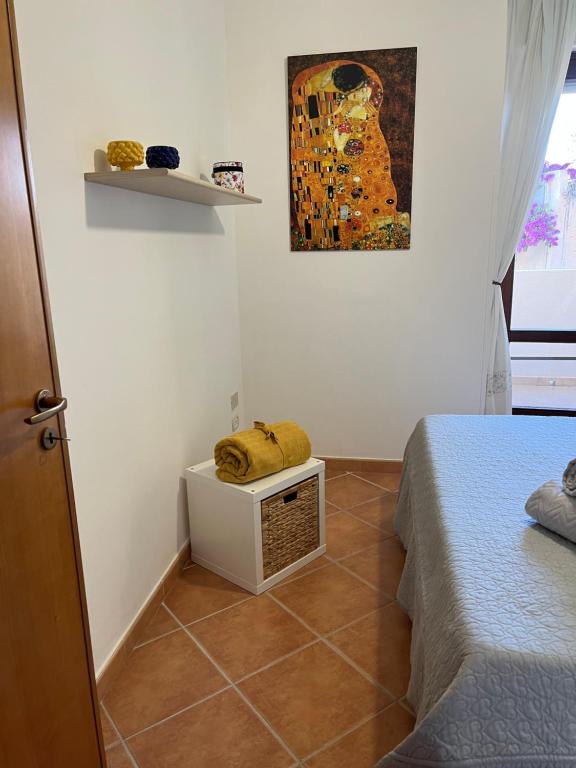 Posteľ alebo postele v izbe v ubytovaní Roseda Casa Vacanze