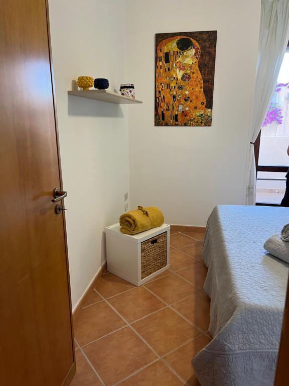 Posteľ alebo postele v izbe v ubytovaní Roseda Casa Vacanze