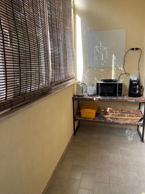 Kuchyňa alebo kuchynka v ubytovaní Roseda Casa Vacanze