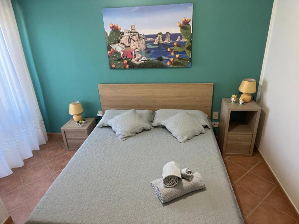Posteľ alebo postele v izbe v ubytovaní Roseda Casa Vacanze