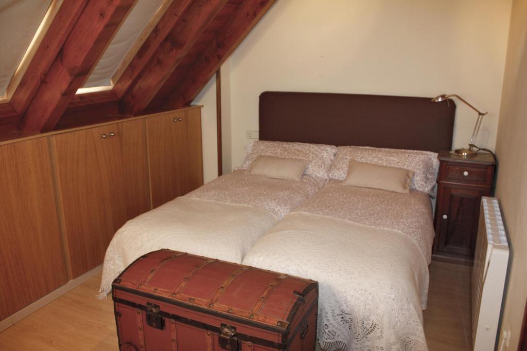 Posteľ alebo postele v izbe v ubytovaní Apartamentos Valle de Aran