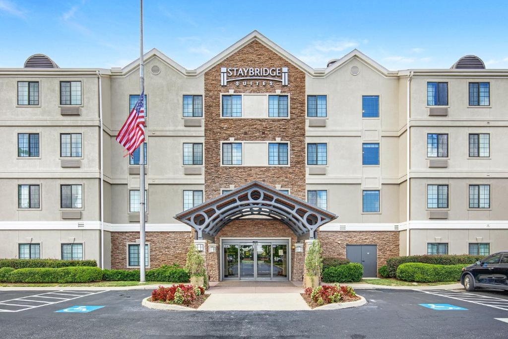 a rendering of the front of a hotel at Staybridge Suites Gulf Shores, an IHG Hotel in Gulf Shores