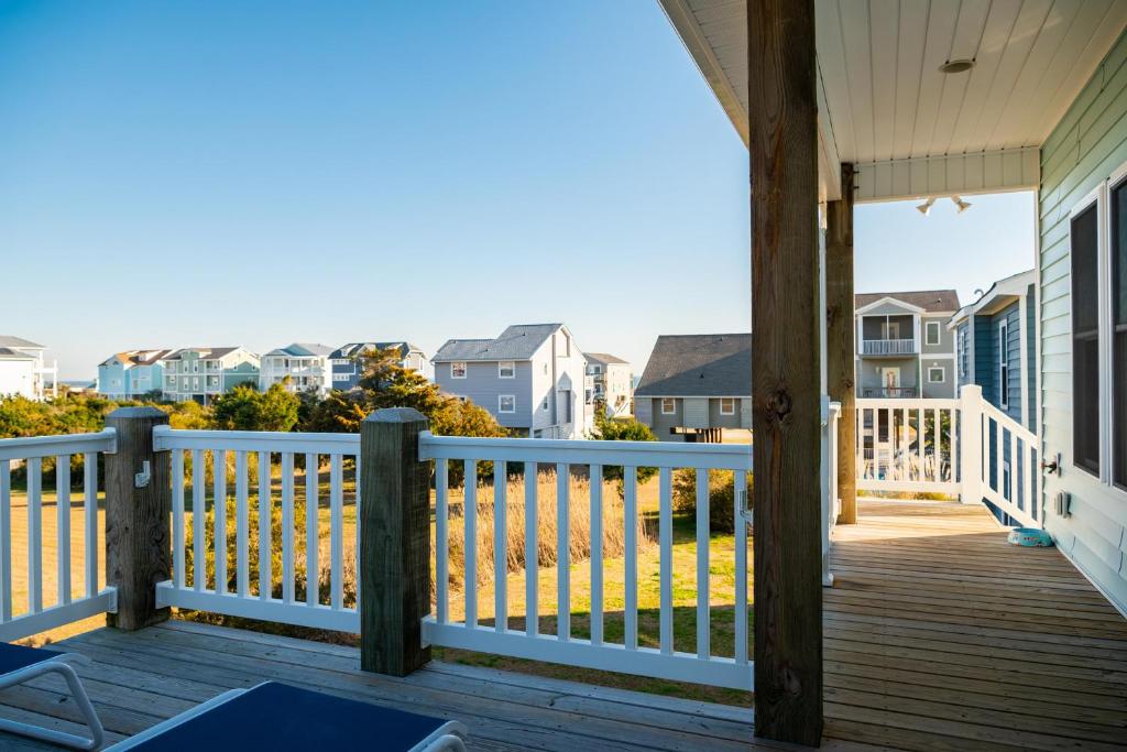 a view from the porch of a house at A Pawsitive Attitude by Oak Island Accommodations in Oak Island