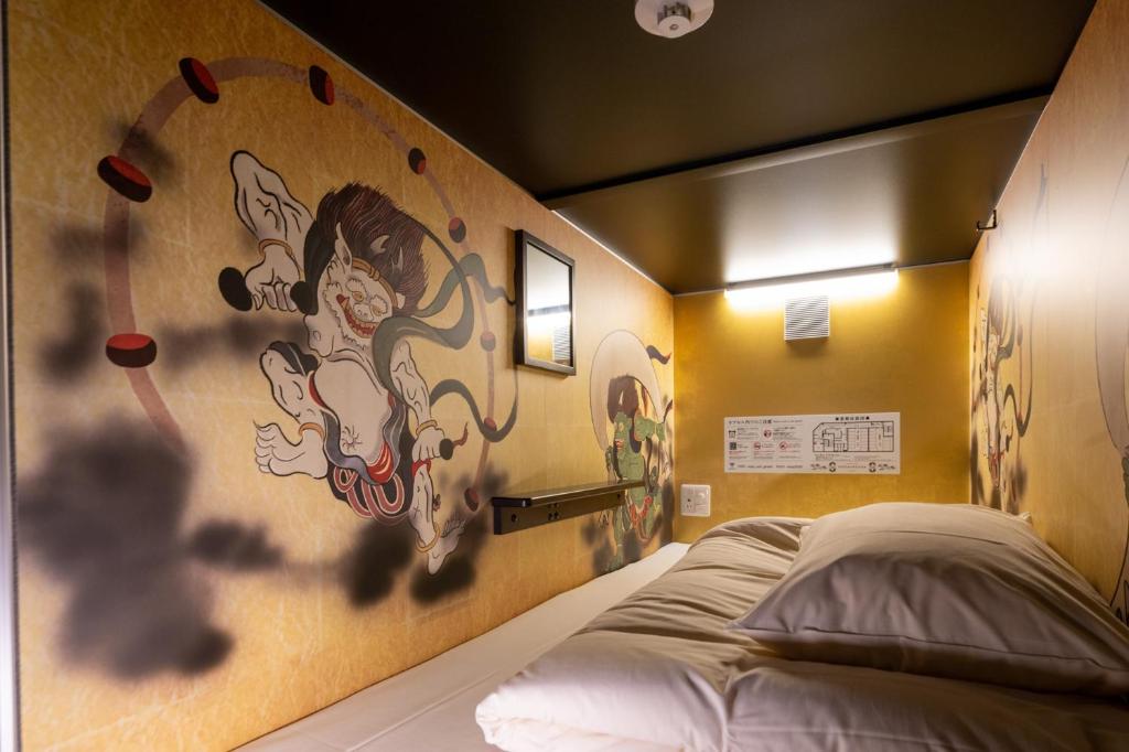 Postel nebo postele na pokoji v ubytování NINJA & GEISHA