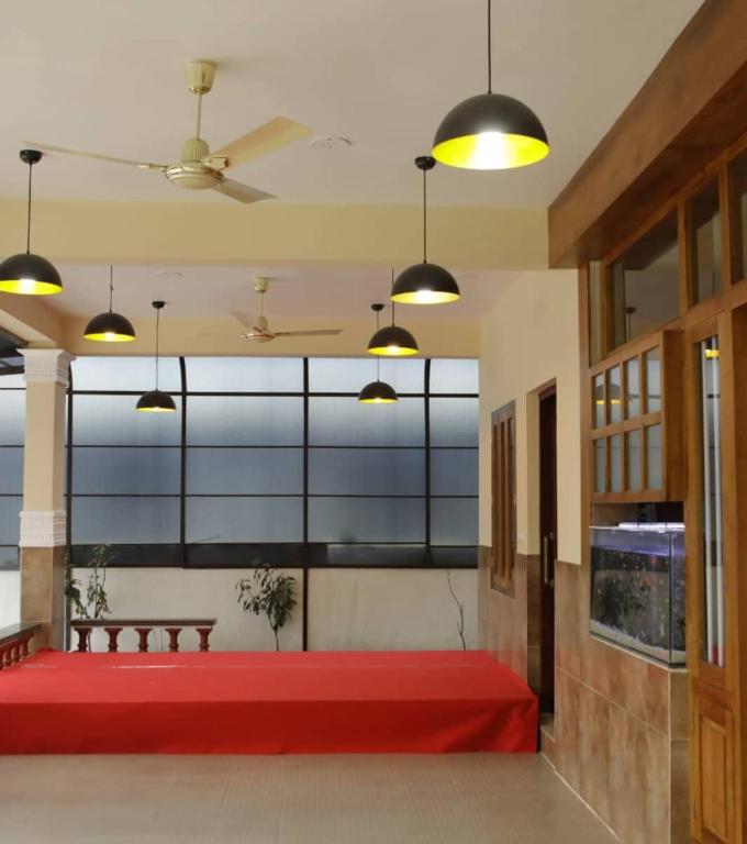 Postel nebo postele na pokoji v ubytování Meghdoot river resort