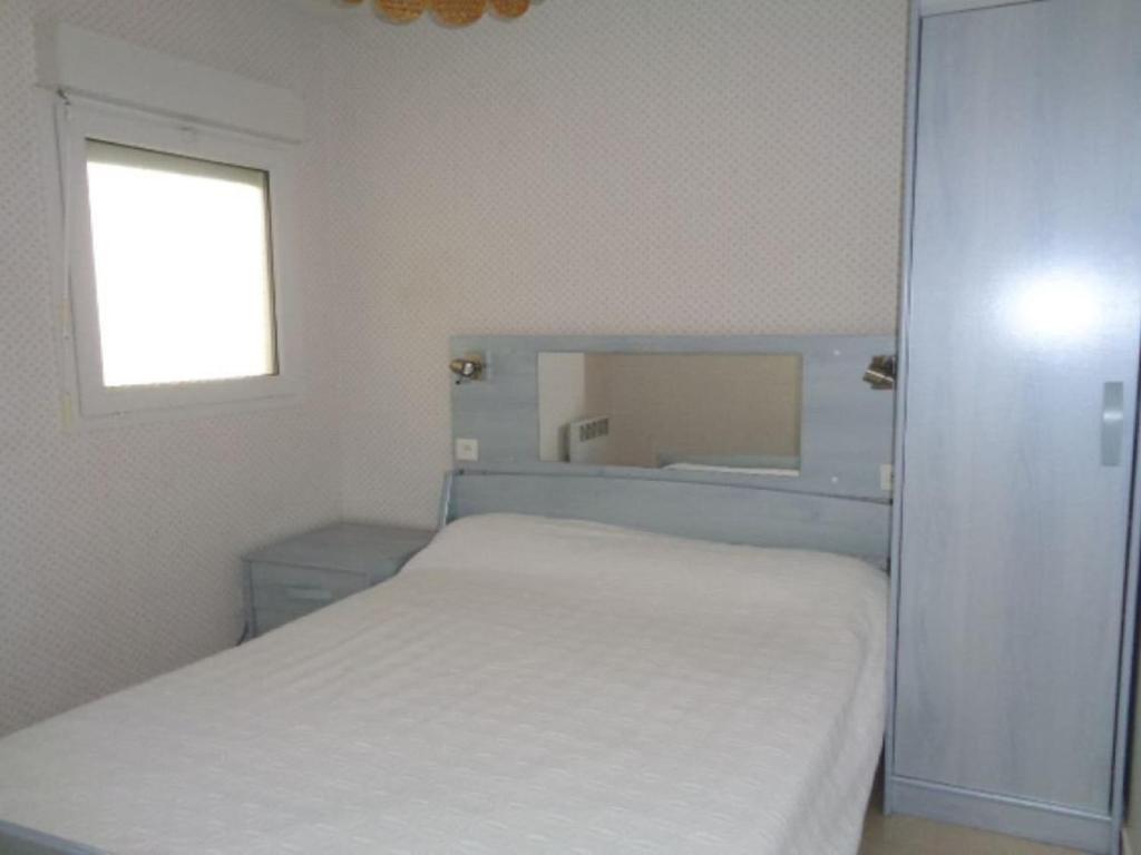 Posteľ alebo postele v izbe v ubytovaní Appartement 3* face mer avec balcon, cuisine équipée, parking privé, proche club nautique - FR-1-672-3