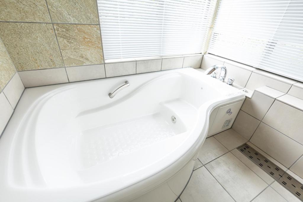 Koupelna v ubytování Resort stay Bowen ~伊豆高原~