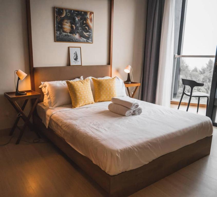 Katil atau katil-katil dalam bilik di Timurbay Seafront Residence [Swan Suite]