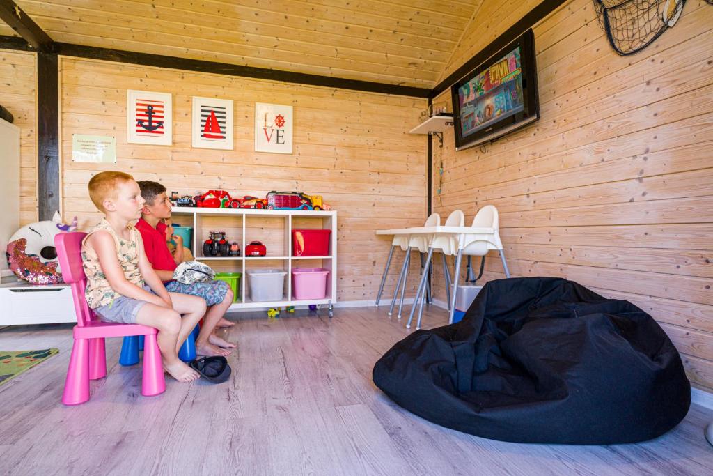 TV a/nebo společenská místnost v ubytování Zielone Wzgórze