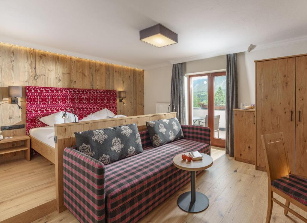 Postel nebo postele na pokoji v ubytování Panoramahotel Gürtl