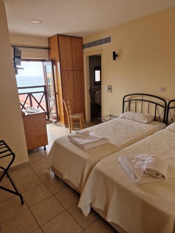 Letto o letti in una camera di Y & P LATCHI HOTEL
