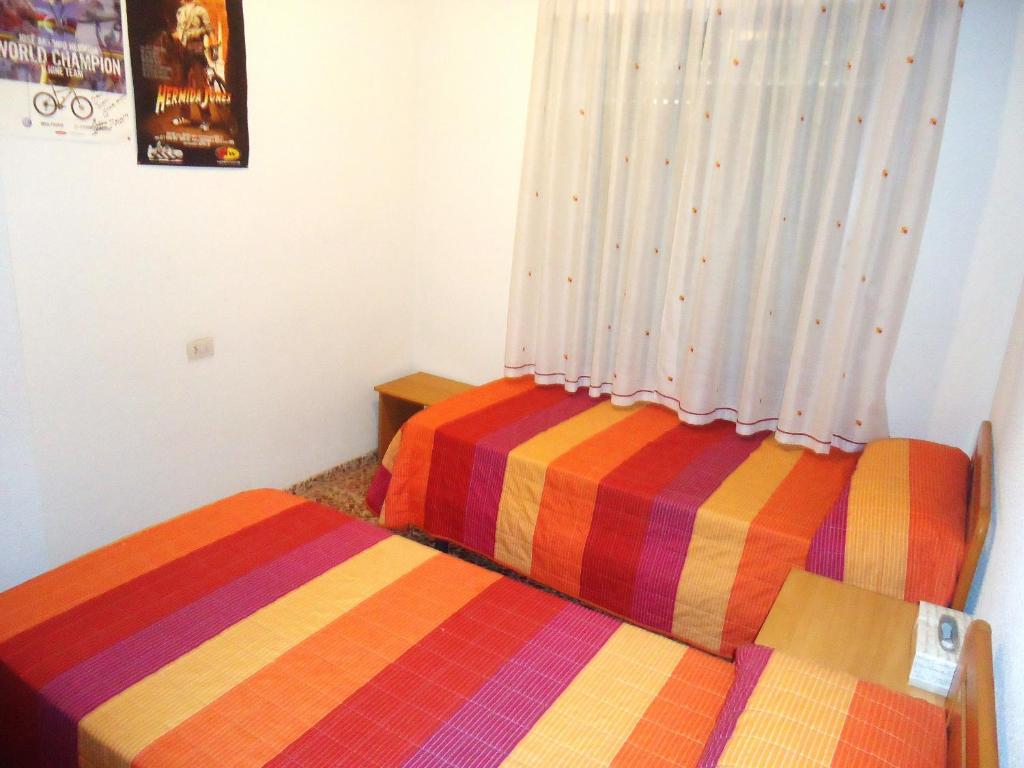 Postel nebo postele na pokoji v ubytování Maestrat II