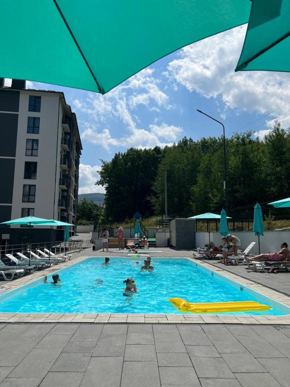 Bazén v ubytování Arena Apart - Hotel nebo v jeho okolí