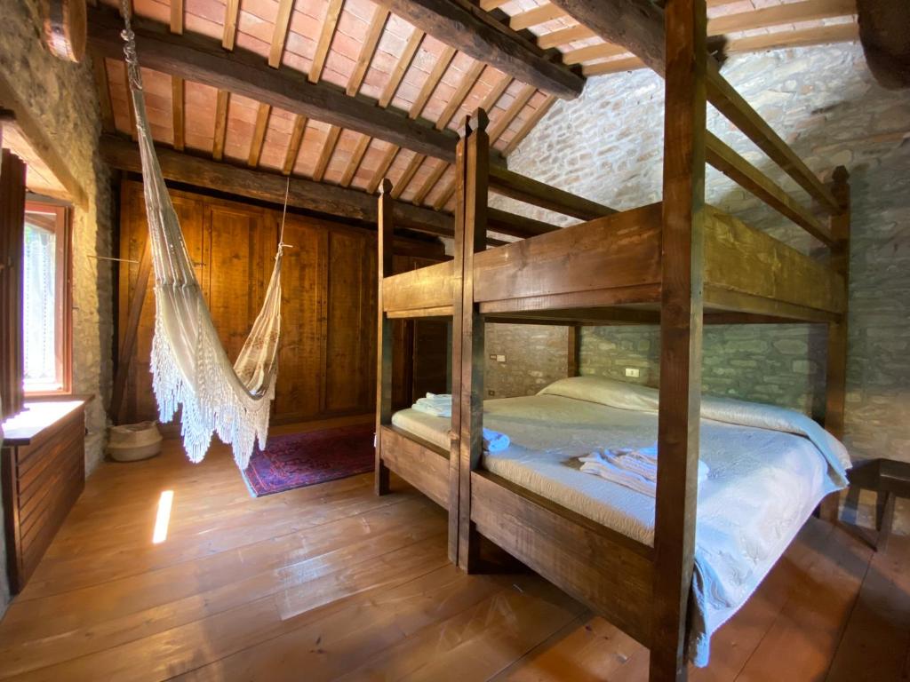 Postel nebo postele na pokoji v ubytování Borgo Corniola B&B Naturista
