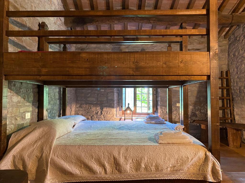 Postel nebo postele na pokoji v ubytování Borgo Corniola B&B Naturista