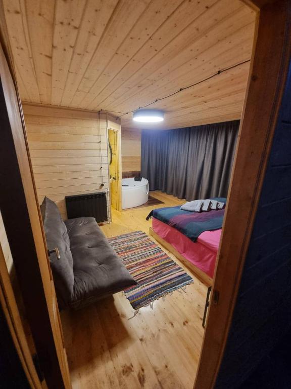 Postel nebo postele na pokoji v ubytování Fifth Season