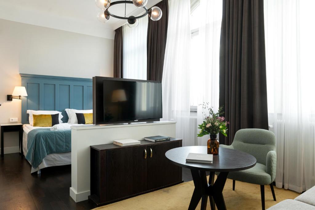 Postel nebo postele na pokoji v ubytování Elite Hotel Mimer