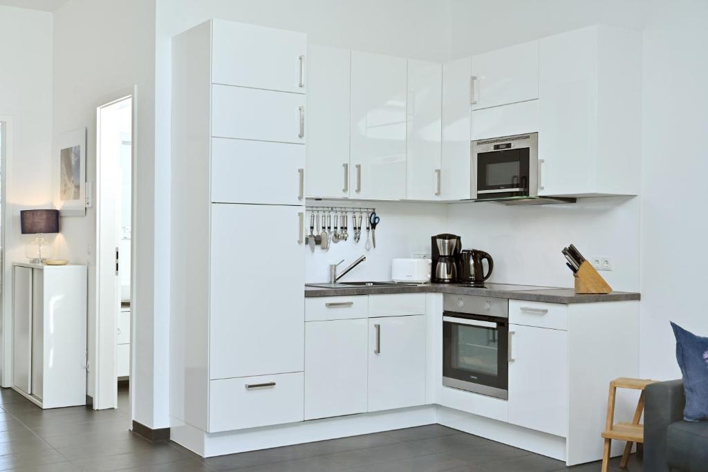 Kuchyň nebo kuchyňský kout v ubytování Ferienwohnung Kala
