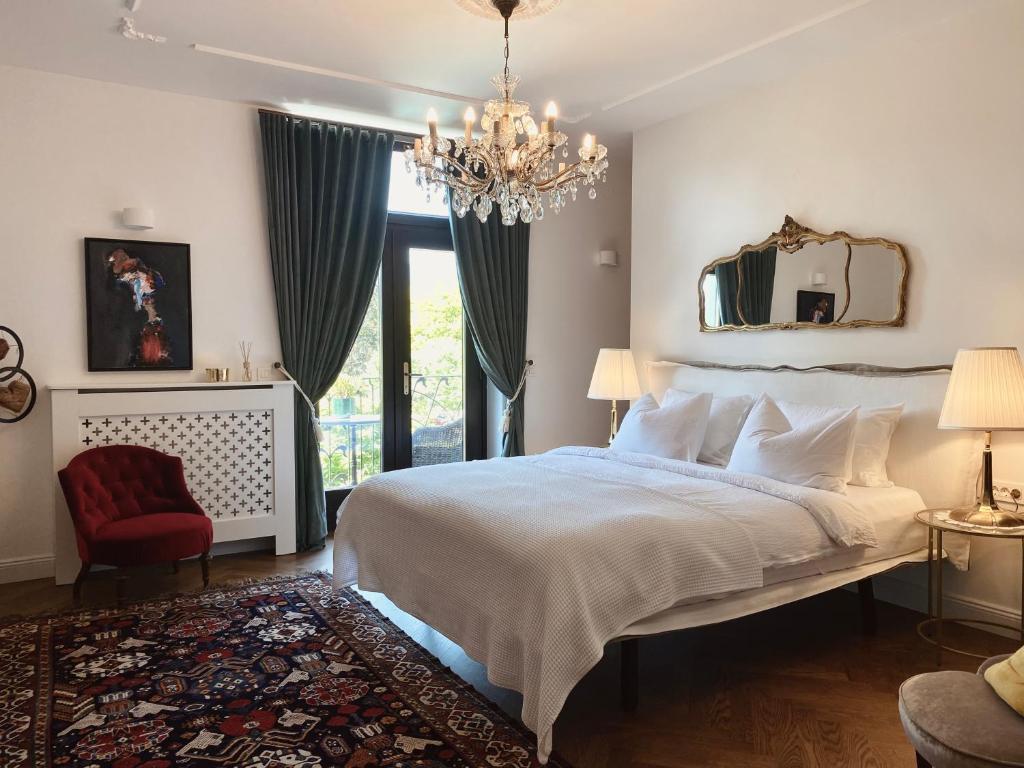 Postel nebo postele na pokoji v ubytování Villa Pomona