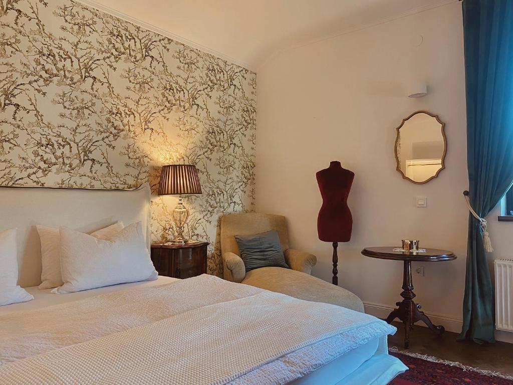 Postel nebo postele na pokoji v ubytování Villa Pomona