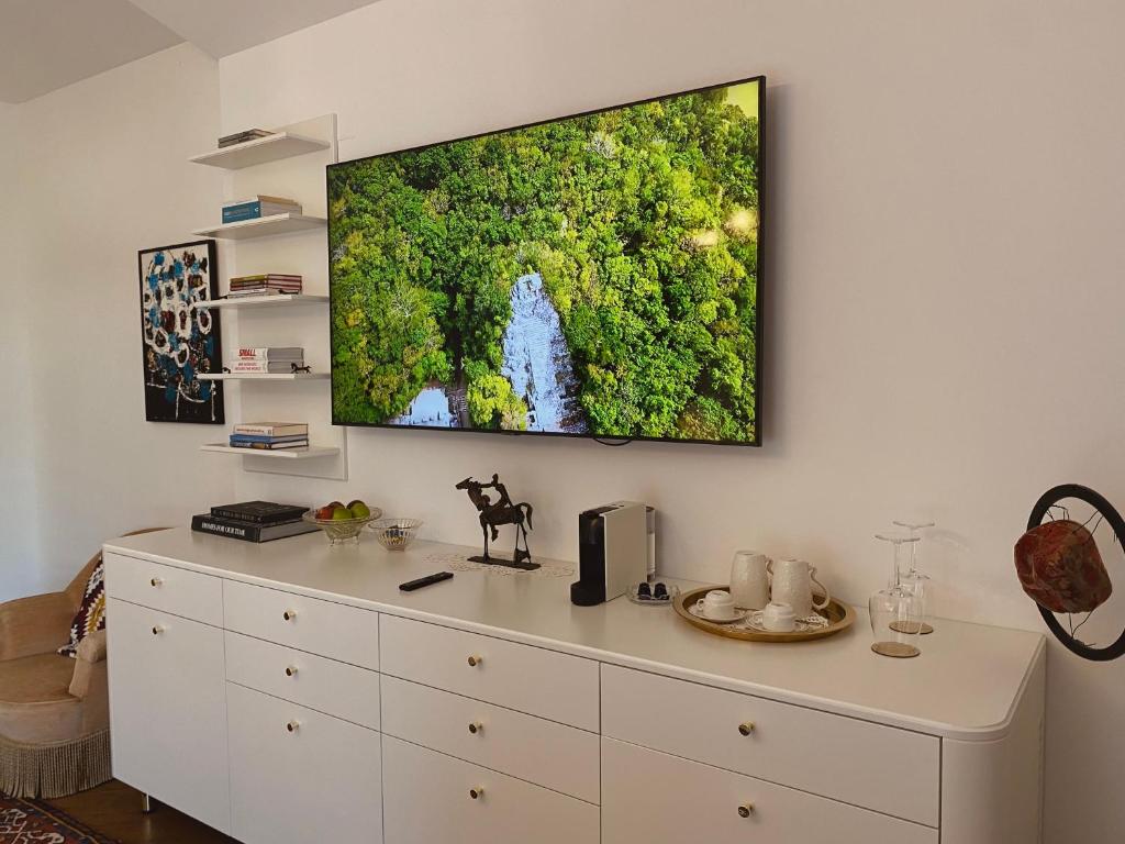 TV a/nebo společenská místnost v ubytování Villa Pomona