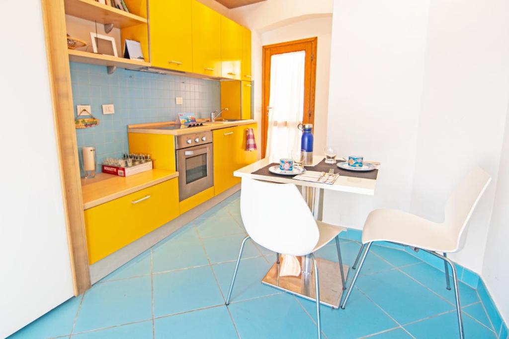 Kuchnia lub aneks kuchenny w obiekcie Oyster Beach - Direttamente sulla Spiaggia del Forno