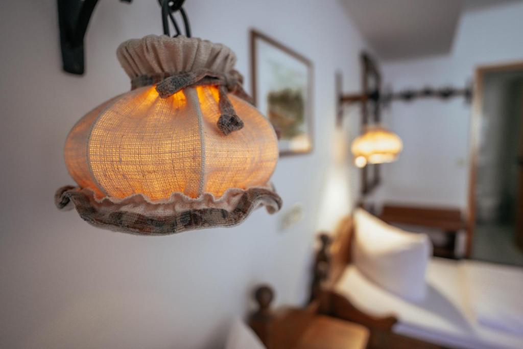 Postel nebo postele na pokoji v ubytování REGIOHOTEL Wolmirstedter Hof Wolmirstedt
