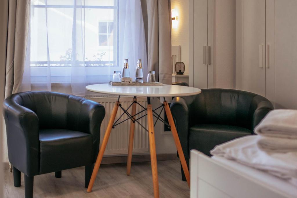 Posezení v ubytování REGIOHOTEL Wolmirstedter Hof Wolmirstedt