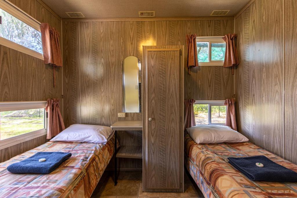 Postel nebo postele na pokoji v ubytování Lazy Days Caravan Park