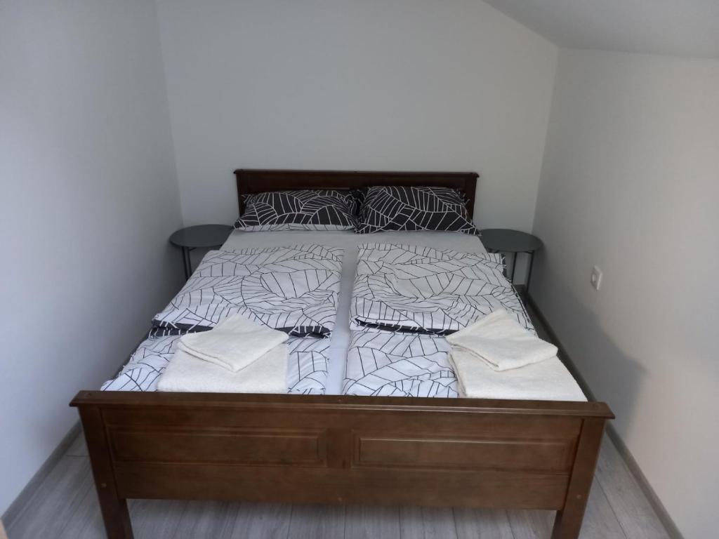 Posteľ alebo postele v izbe v ubytovaní Apartmani Dubrava 2
