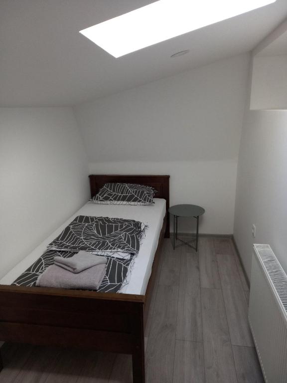 Posteľ alebo postele v izbe v ubytovaní Apartmani Dubrava 2