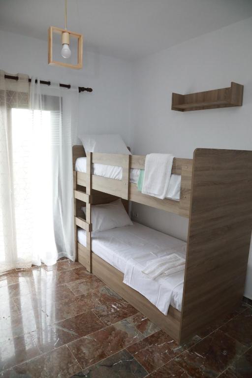 Postel nebo postele na pokoji v ubytování Lemon tree house