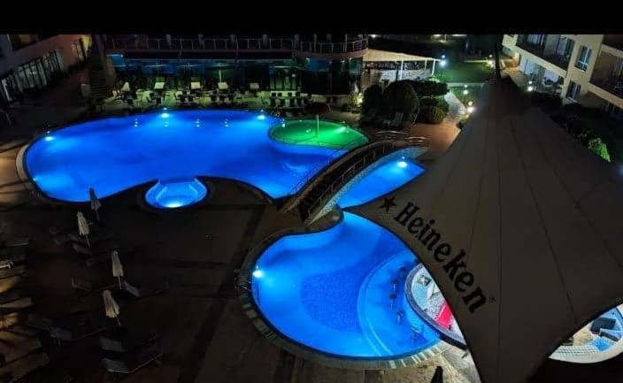 The swimming pool at or close to Sunset Dream Polo Resort