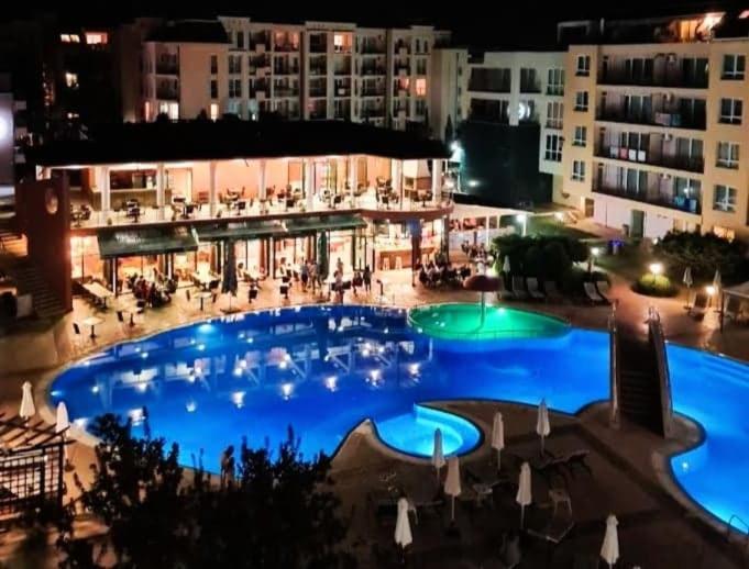 The swimming pool at or close to Sunset Dream Polo Resort