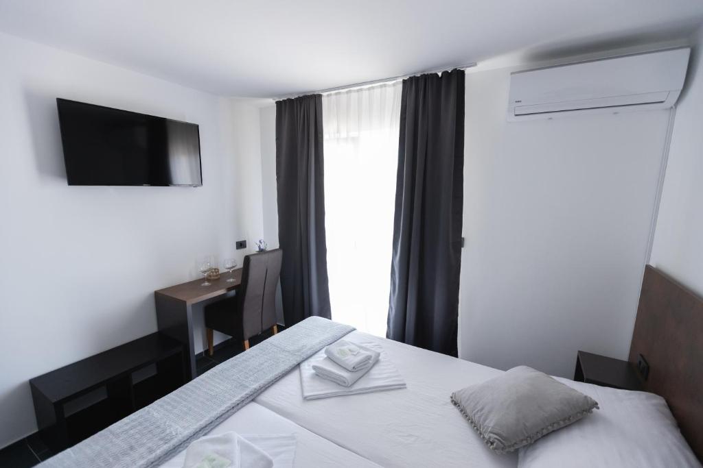 Katil atau katil-katil dalam bilik di D8 B&B