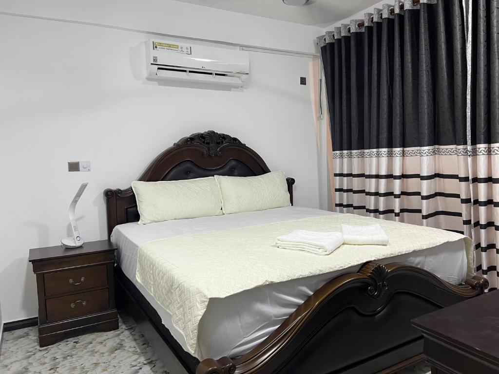 Postel nebo postele na pokoji v ubytování Seaside Resort