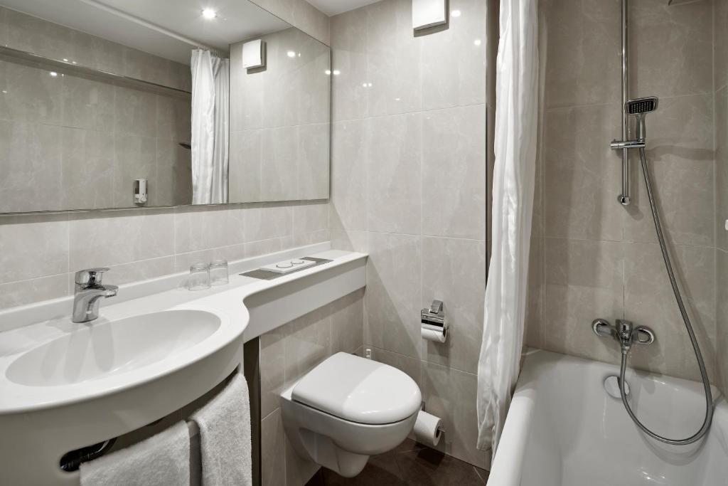 Koupelna v ubytování Hotel Kraft