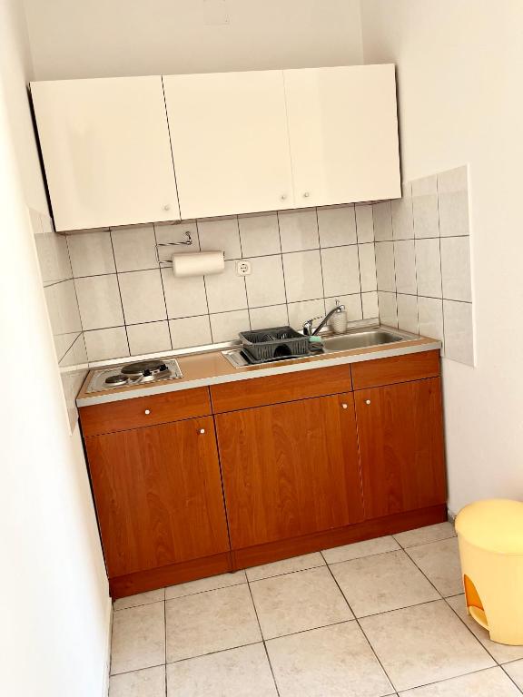 Kuchnia lub aneks kuchenny w obiekcie Apartments Fortuna